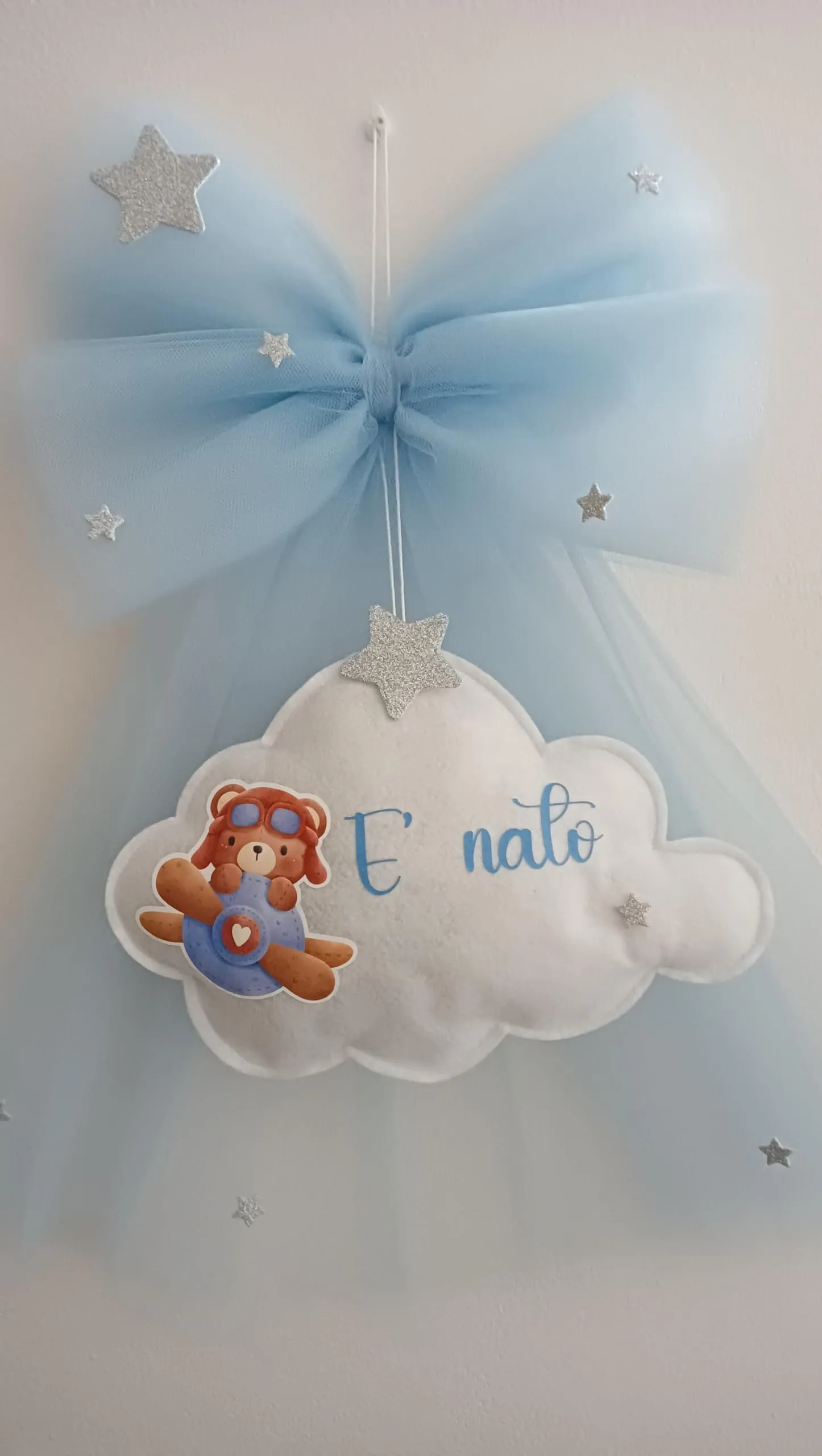 Fiocco nascita bimbo in tulle celeste con nome personalizzato, nuvola in pannolenci.
