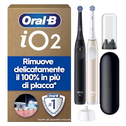 Oral-B iO 2, 2 Spazzolini Elettrici, 2 Testina di Ricambio, Nero e Rosa - 2 Testine di Ricambio per Spazzolino Elettrico, Custodia da Viaggio, Sensore di Pressione, Pulizia Denti Efficace